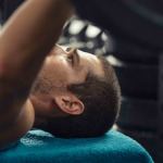 Man doing weight lift with barbell