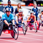 Athletes on wheelchairs in the olympic stadium