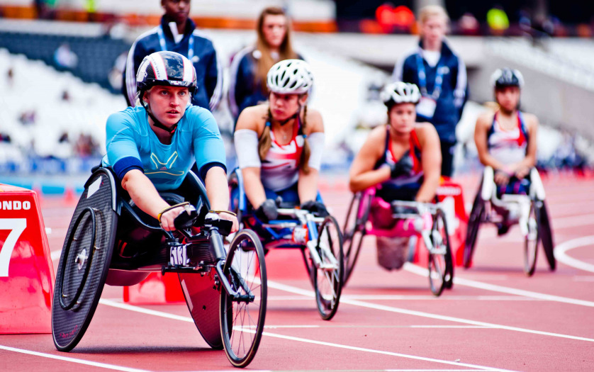 Athletes on wheelchairs in the olympic stadium