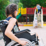 girl in wheelchair at the park