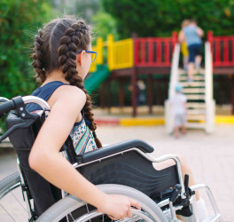girl in wheelchair at the park