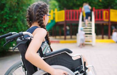 girl in wheelchair at the park
