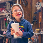 kid with autism with big drink
