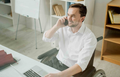 Businessman in wheelchair at work