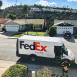 FedEx making a ground delivery in a San Diego neighborhood