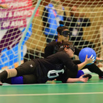 Athlete with vision disabilities in action during Goalball in Asian Para Games