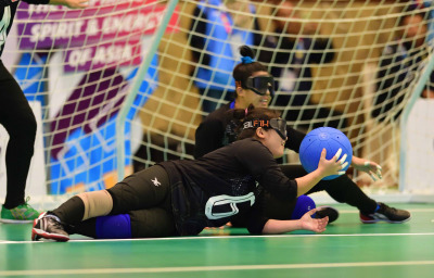 Athlete with vision disabilities in action during Goalball in Asian Para Games