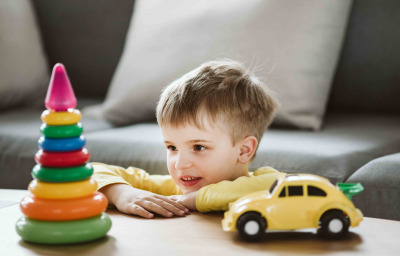 kid with autism Playing with toys