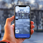 a person hand holding smartphone with Item Identifier app outdoor