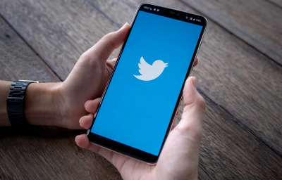Smartphone with twitter logo on screen