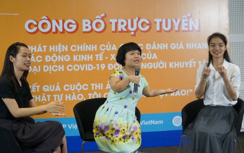 Live interview: right to left - Nhu Quynh (interviewee); Nguyen Minh Chau (interviewer) Vu Giang (sign language interpreter)
