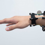 a person hand wearing the device