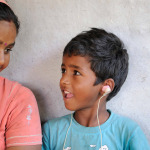 mother with deaf son, smiling