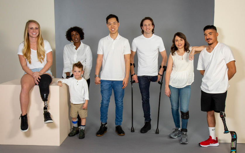 group photo of people with adaptive shoes
