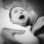 A newborn baby screaming out loud