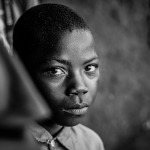 black and white image of an african boy