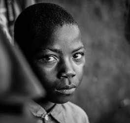 black and white image of an african boy