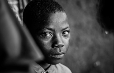 black and white image of an african boy