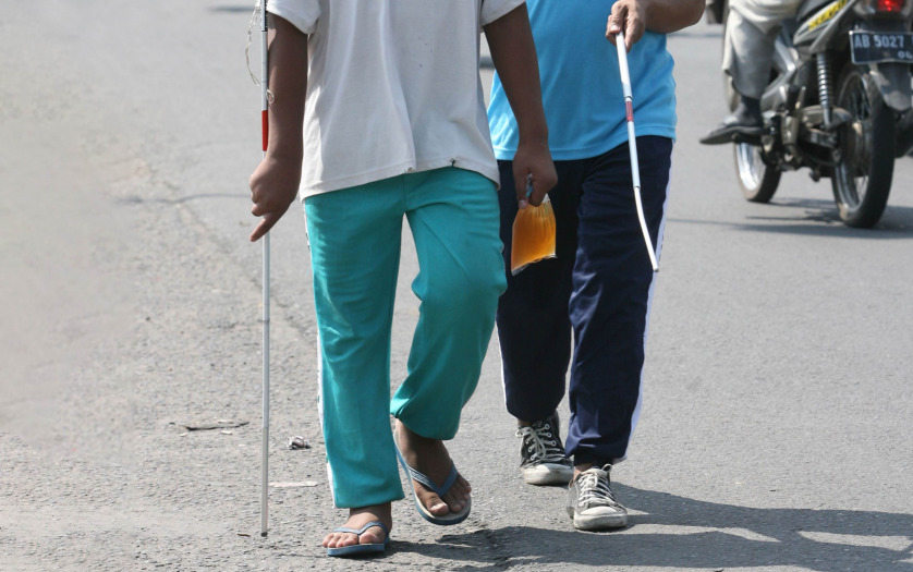 Blind people walking