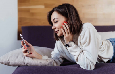Woman making a video call from her phone