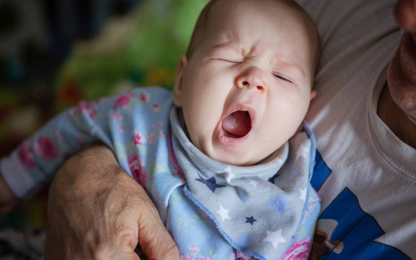 Baby girl yawning