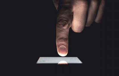 Close up of man's hands touching smart phone