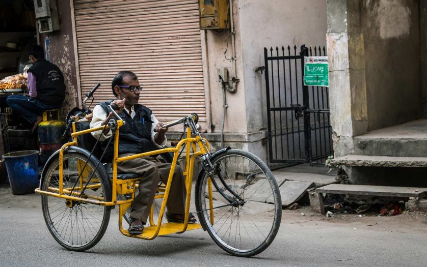 A disabled person riding a with Tricycle, Jaipur, India