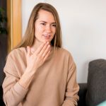 Deaf woman communicating through sign language