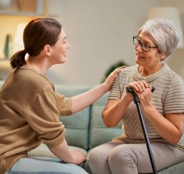 Elderly patient and caregiver spending time together