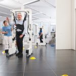 Man using an exoskeleton