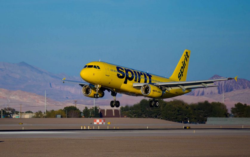 A Spirit Airlines Airbus aircraft landing at Las Vegas McCarran International Airport.