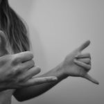 Woman interpreting American Sign Language
