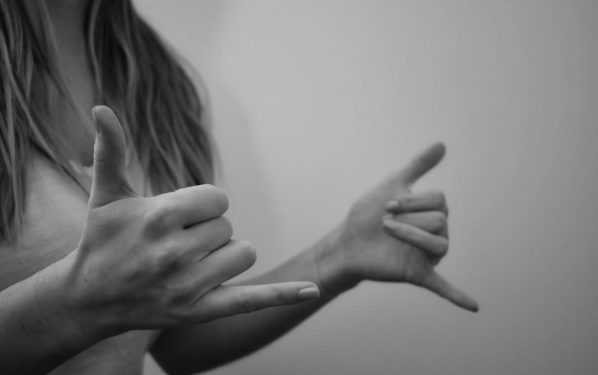 Woman interpreting American Sign Language