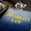 Disability Law book and stethoscope on the desk.