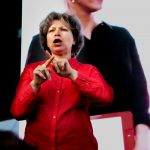 sign language interpreter works on the stage