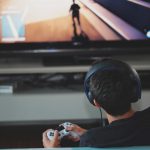 A boy plays video games