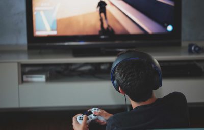 A boy plays video games