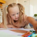 Girl with Down Syndrome in Art Class