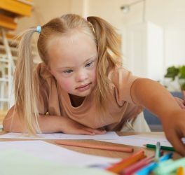 Girl with Down Syndrome in Art Class