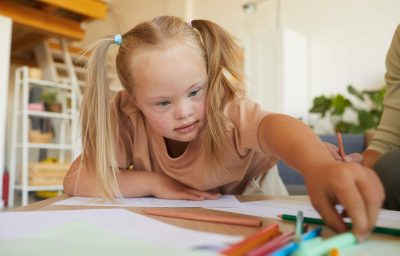 Girl with Down Syndrome in Art Class