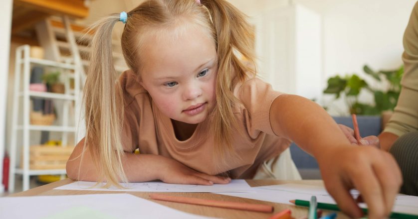 Girl with Down Syndrome in Art Class