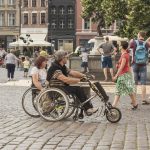 two wheelchair users outdoor