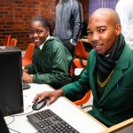 Students learning at Computer Skills Training Center in Africa