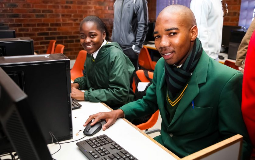 Students learning at Computer Skills Training Center in Africa