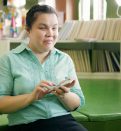 young blind woman using smartphone