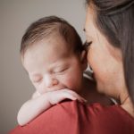 mother holding little baby
