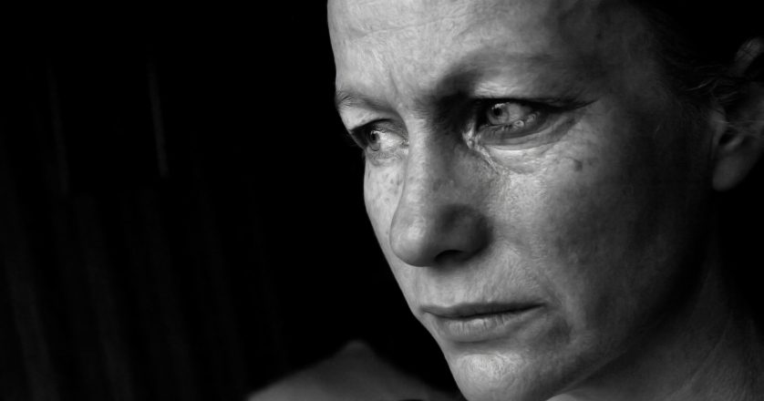 Image of a woman in tears, conceptual domestic violence