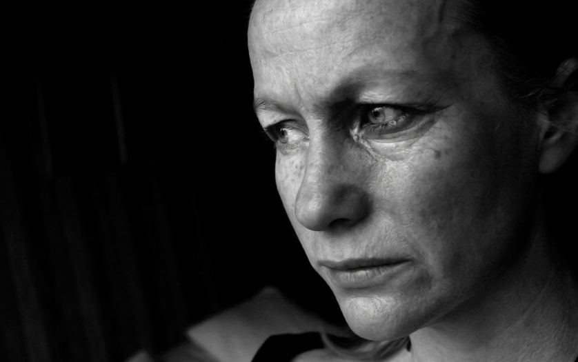 Image of a woman in tears, conceptual domestic violence