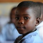 African School boy in class