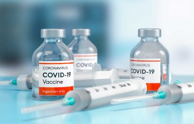 Medical Vaccine bottle vial of Covid-19 coronavirus in a research medical lab